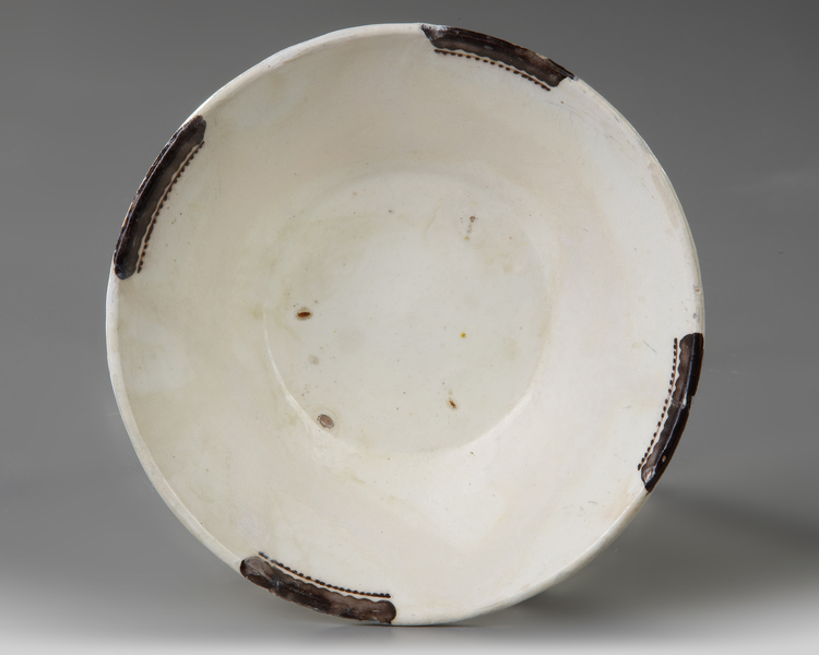 A NISHAPUR POTTERY SAMANID BOWL, 9TH-10TH CENTURY