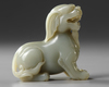 A PALE GREEN JADE CARVING OF A QILIN, 19TH CENTURY