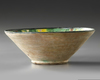 A NISHAPUR TANG SPLASHED BOWL, PERSIA, 10TH-11TH CENTURY