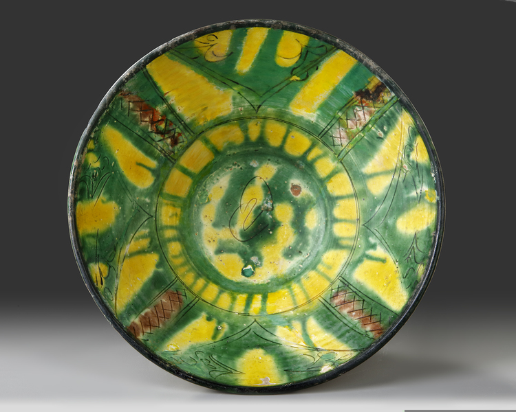 A NISHAPUR TANG SPLASHED BOWL, PERSIA, 10TH-11TH CENTURY