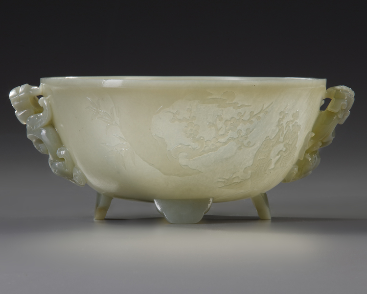 A CHINESE CELADON JADE 'POETIC' TWIN HANDLED BOWL, QING DYNASTY (1644-1911)