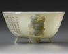 A CHINESE CELADON JADE 'POETIC' TWIN HANDLED BOWL, QING DYNASTY (1644-1911)
