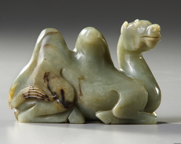 A CHINESE GREEN JADE CAMEL, 18TH-19TH CENTURY