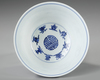 A CHINESE BLUE AND WHITE 'LOTUS AND BAJIXIANG' BOWL, QING DYNASTY (1644-1911)