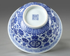 A CHINESE BLUE AND WHITE 'LOTUS AND BAJIXIANG' BOWL, QING DYNASTY (1644-1911)