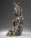 A LARGE CHINESE HEAVILY CAST BRONZE GUANYIN, MING DYNASTY (1368-1644) OR LATER