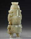 A CELADON JADE VASE WITH COVER, QING DYNASTY (1644-1911)