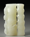 A CHINESE PALE CELADON JADE 'MONKEY AND BAMBOO' CARVING, 19TH-20TH CENTURY
