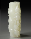 A CHINESE PALE CELADON JADE 'MONKEY AND BAMBOO' CARVING, 19TH-20TH CENTURY
