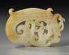 A  CHINESE PALE CELADON AND RUSSET JADE 'DRAGON AND PHOENIX' PLAQUE, 19TH CENTURY