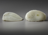 TWO LARGE CHINESE PALE CELADON JADE 'BOYS' CARVINGS, 20TH CENTURY