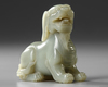 A PALE GREEN JADE CARVING OF A QILIN, 19TH CENTURY