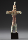 A CANAANITE BRONZE FEMALE FIGURE, CIRCA EARLY 2ND MILLENIUM B.C.