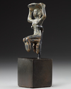 A WESTERN ASIATIC PROTO-ELAMITE STATUETTE, CIRCA 3100-2700 B.C.