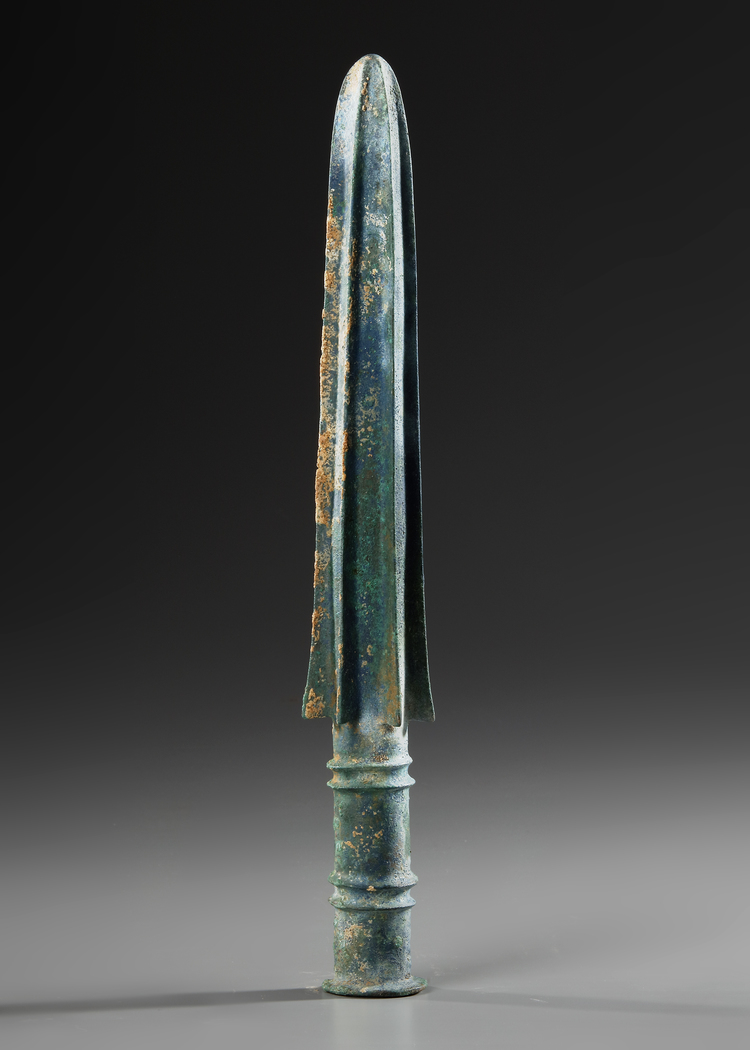 A WESTERN ASIATIC  BRONZE SPEAR HEAD, CIRCA 800-600 B.C.