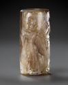 A NEO-BABYLONIAN CYLINDER BANDED AGATE CYLINDER SEAL, CIRCA 900-700 B.C.