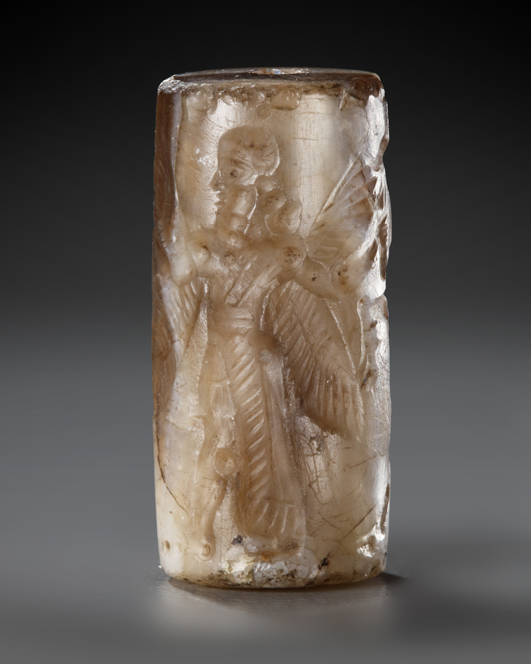A NEO-BABYLONIAN CYLINDER BANDED AGATE CYLINDER SEAL, CIRCA 900-700 B.C.