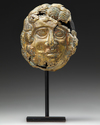 A GRECO-ROMAN GILT BRONZE MASK, CIRCA 1ST CENTURY B.C. / A.D.