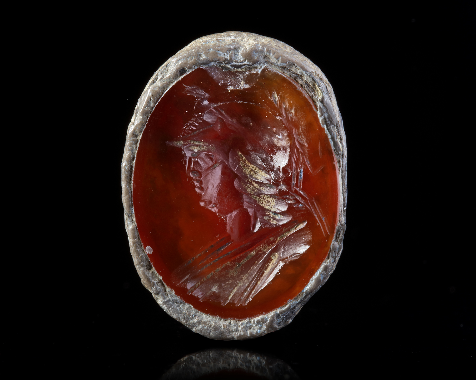 A CARNELIAN INTAGLIO OF MINERVA IN A SILVER MOUNT, 2ND CENTURY AD