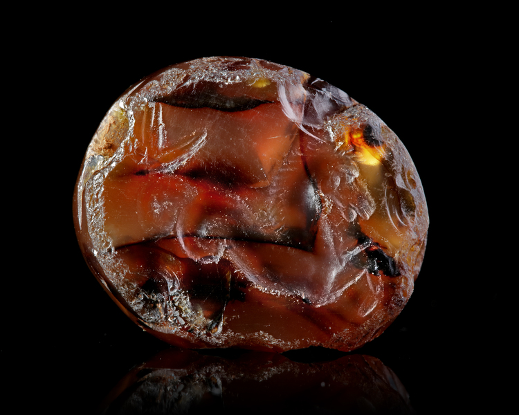A CARNELIAN SCARABOID WITH AN ENGRAVED HIPPOCAMP, 4TH CENTURY BC OR LATER
