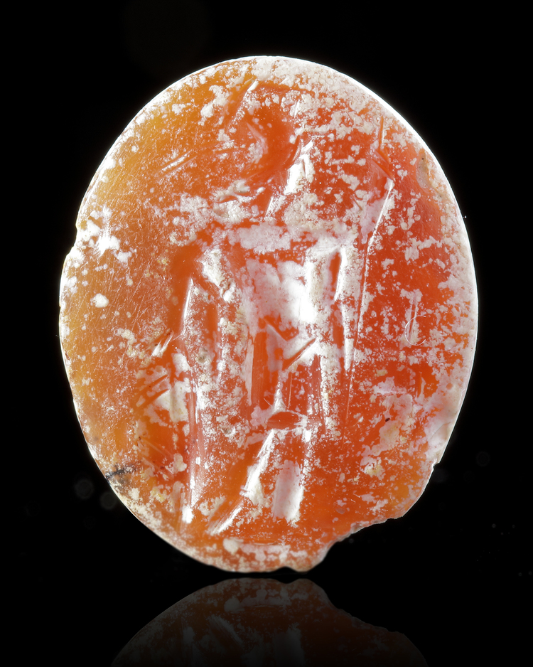 A CARNELIAN INTAGLIO WITH A STANDING MARS, 2ND CENTURY AD