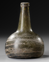 A GERMAN GLASS BOTTLE, 16TH/17TH CENTURY