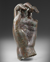 A ROMAN BRONZE FEMALE LEFT HAND, CIRCA 1ST CENTURY AD