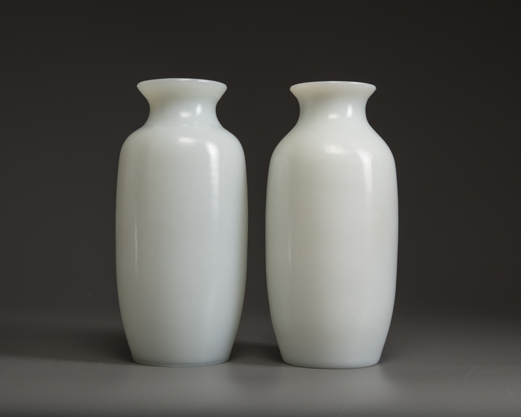 A pair of Chinese milky-white glass vases