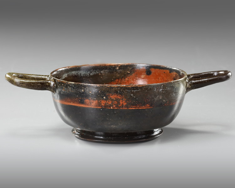 A GREEK POTTERY BOLSAL BLACK SLIP WINE CUP, CIRCA 4TH CENTURY BC