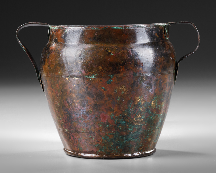 A ROMAN BRONZE CUP WITH TWO HANDLES, CIRCA 1ST/ 2ND CENTURY A.D.