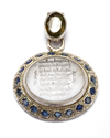 A CRYSTAL SILVER MOUNTED AND GEMSTONES- SET CARVED PENDANT, 4TH AH -11TH AD CENTURY