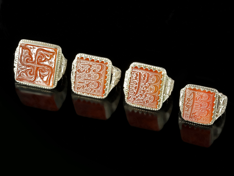 FOUR AGATE SEAL SILVER RINGS