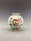 An iron-red-decorated green enamelled 'dragon' jar