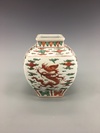 An iron-red-decorated green enamelled 'dragon' jar