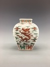 An iron-red-decorated green enamelled 'dragon' jar