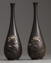 A pair of Japanese bronze vases