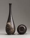 A pair of Japanese bronze vases