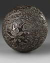 A QAJAR CARVED COCONUT HUQQA BASE, PERSIA, EARLY 19TH CENTURY