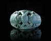 AN EGYPTIAN TURQUOISE FAIENCE RING WITH TWO SCARABS, CIRCA 700-500 B.C.