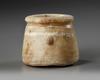 AN EGYPTIAN TRAVERTINE TWO-HANDLED JAR, CIRCA 1069-404 B.C.