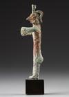 A CANAANITE BRONZE FEMALE FIGURE, CIRCA EARLY 2ND MILLENIUM B.C.