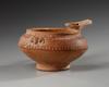 AN AMLASH TERRACOTTA PAINTED SPOUTED VESSEL, CIRCA EARLY 1ST MILLENNIUM B.C.