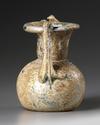 A ROMAN GLASS JAR WITH TWO HANDLES, CIRCA 3RD-4TH CENTURY A.D.