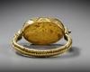 A GREEK GOLD RING WITH GARNET INTAGLIO, HELLENISTIC PERIOD, CIRCA 3RD CENTURY B.C.