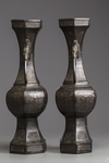 A pair of Chinese bronze hexagonal vases