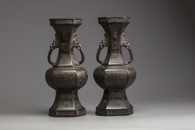 A pair of Chinese bronze hexagonal vases