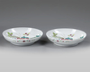 A PAIR OF CHINESE FAMILLE ROSE PLATES, 19TH CENTURY