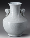 A CHINESE VASE WITH ELEPHANT HANDLES, 18TH CENTURY