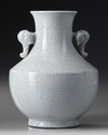 A CHINESE VASE WITH ELEPHANT HANDLES, 18TH CENTURY