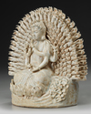 A CHINESE QINGBAI STATUE OF GUANYIN, MING DYNASTY (1368-1644)